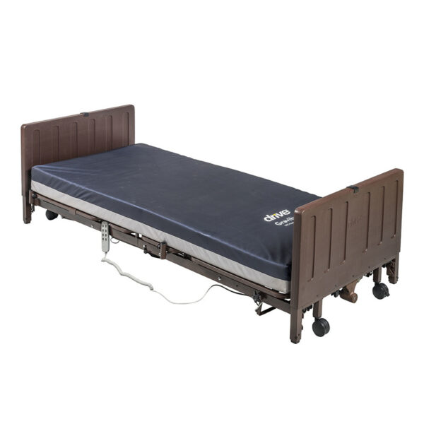 The Delta® Pro Homecare Hi-Low Bed System features a black mattress, brown headboard and footboard, and an attached electric control unit on the side.