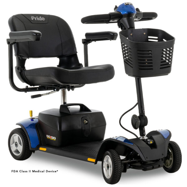 The Go Go® Elite Traveller, 4-Wheel, 18 Ah Battery is a blue mobility scooter featuring a black seat with armrests and a front basket. It is also labeled as an FDA Class II Medical Device.